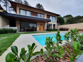 Casa com 4 suítes na Serra C8